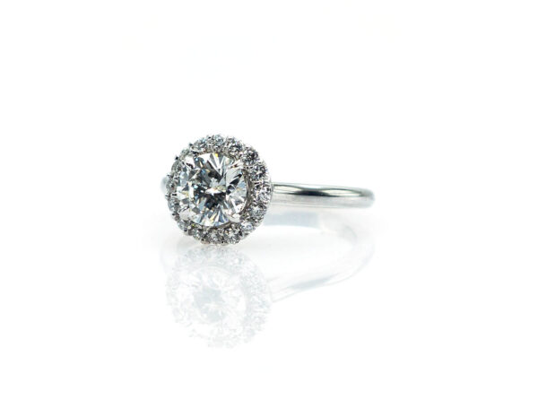 1.21 Ct Natural Diamond surrounded by .36 Ct of Diamonds in 14K White Gold