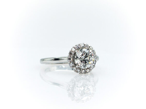 1.21 Ct Natural Diamond surrounded by .36 Ct of Diamonds in 14K White Gold